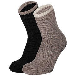 Alpaca wollen huissokken gedragen op een voet