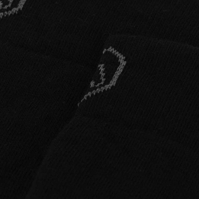 Close-up van anatomisch ontwerp Apollo skisokken zwart met vochtafvoerende materialen