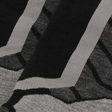 Close-up van de extra padding en verstevigde zones van Xtreme snowboard sokken voor bescherming tijdens wintersport