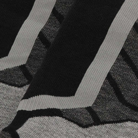 Close-up van de extra padding en verstevigde zones van Xtreme snowboard sokken voor bescherming tijdens wintersport