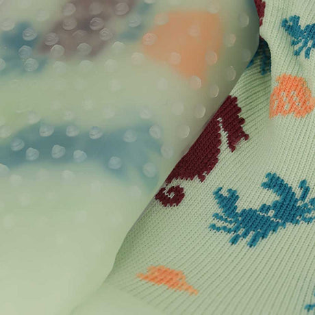Anti-slip zool van Apollo Kids watersokken groen voor natte ondergronden